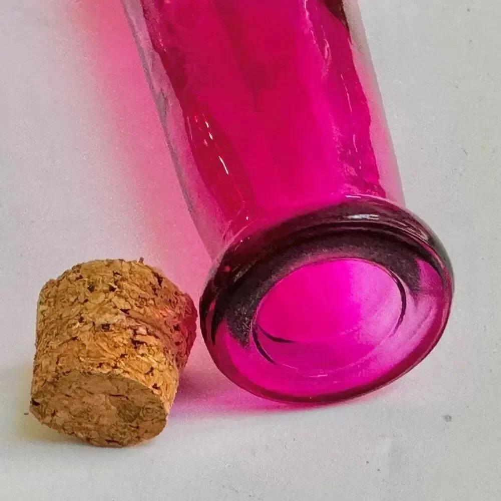 Vintage pink bottle with cork
